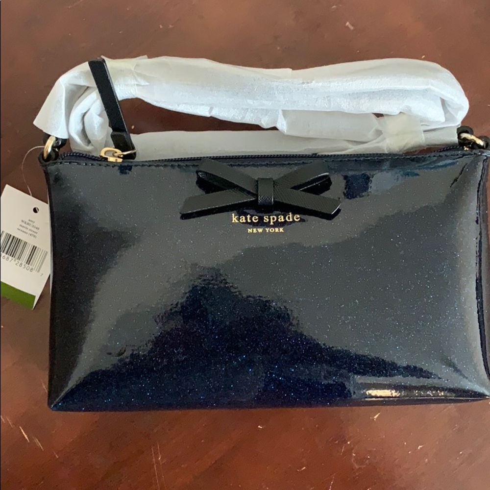 Kate spade small purse...blue with glitter color